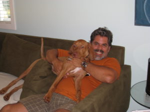 Photo of Dog Enzo with Carl Lynn Jenkins in 2008.